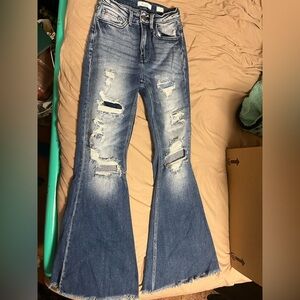 KanCan distress flared jeans, size 25 bought from the Buckle